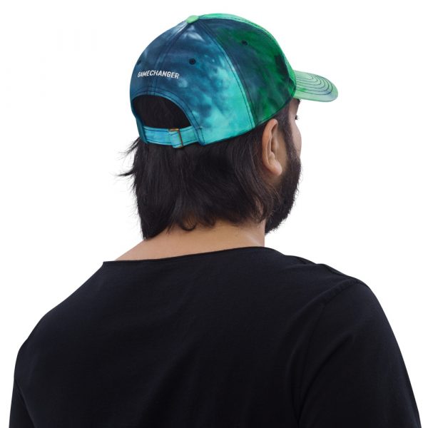 Man wearing blue and green gamechanger tie die hat